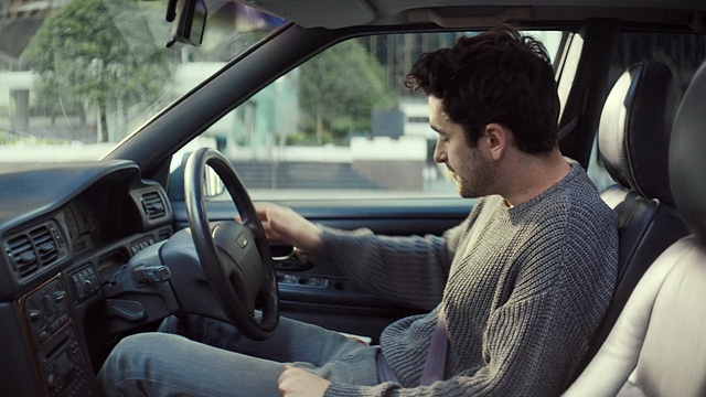 Video Reference: car, motor vehicle, vehicle, driving, automotive design, steering part, steering wheel, family car, vehicle door, city car, Person