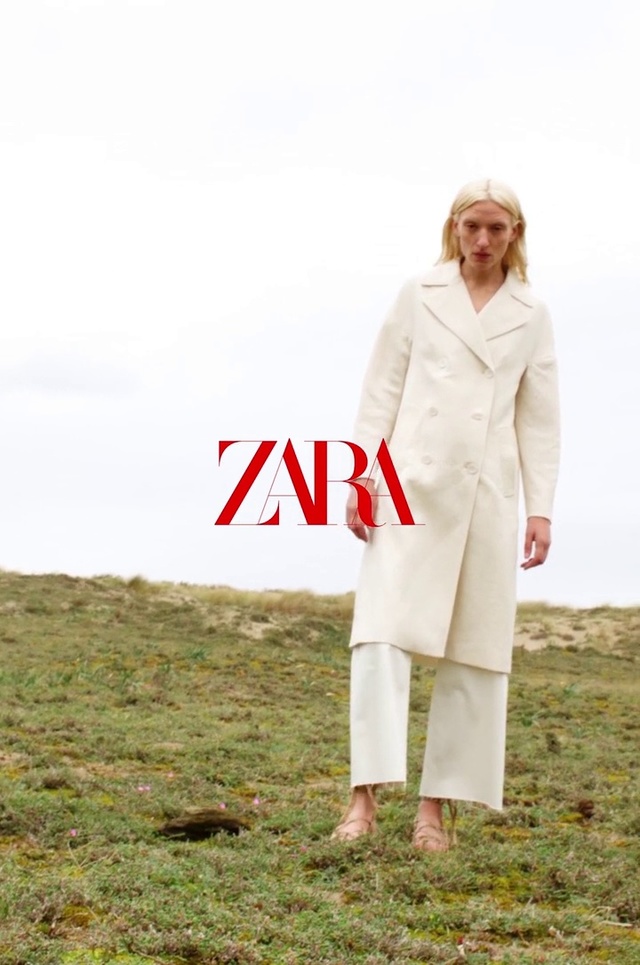 Video Reference: White, Clothing, Standing, Grass, Outerwear, Trench coat, Robe, Sleeve, Coat, Photography, Person