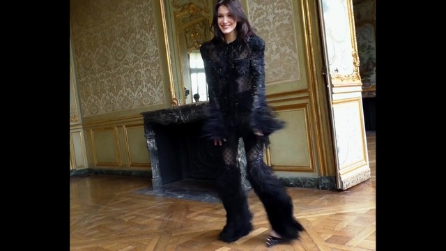 Video Reference: Fur, Clothing, Fur clothing, Tights, Lady, Footwear, Dress, Boot, Outerwear, Fashion, Person