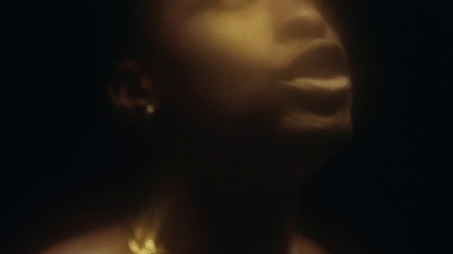 Video Reference: Black, Darkness, Light, Sky, Nose, Head, Atmosphere, Brown, Lighting, Atmospheric phenomenon