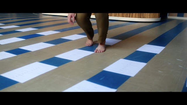 Video Reference: blue, floor, indoor games and sports, flooring, line, wood, hand, hardwood, material, mat