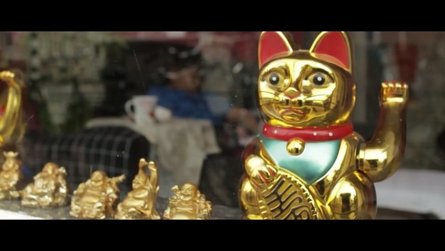Video Reference: Figurine, Fictional character, Gold, Action figure, Temple, Metal, Person
