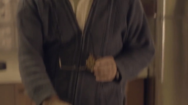 Video Reference: clothing, black, shoulder, dress, outerwear, standing, jacket, suit, sleeve, arm, Person