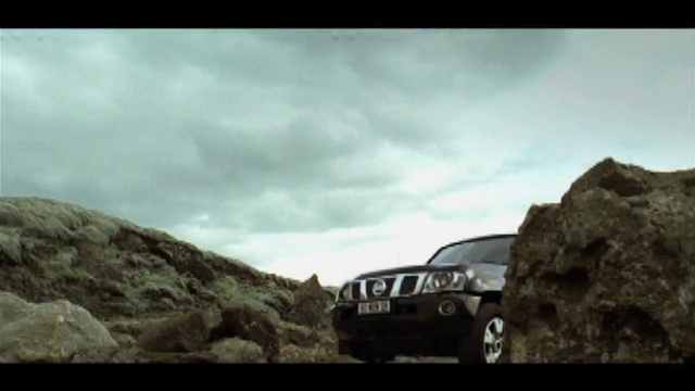 Video Reference: car, vehicle, off roading, mountainous landforms, motor vehicle, mode of transport, rock, off road vehicle, terrain, road