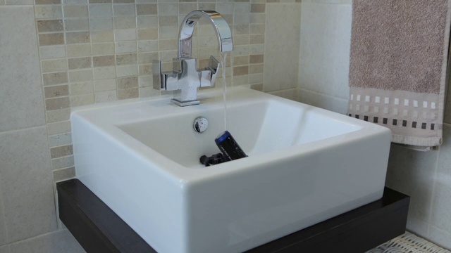 Video Reference: Sink, Bathroom sink, Plumbing fixture, Bathroom, Tap, Bathtub, Product, Room, Tile, Plumbing