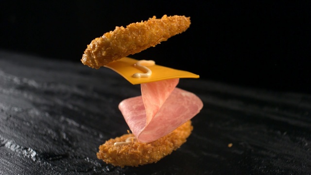 Video Reference: chicken, cheese, table, ham, fried chicken