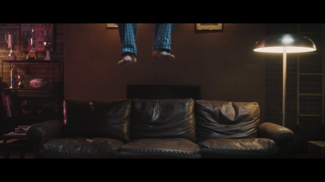 Video Reference: Black, Room, Light, Couch, Lighting, Darkness, Furniture, Living room, Screenshot, Interior design, Person