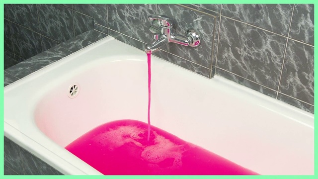 Video Reference: Pink, Bathtub, Bathroom, Plumbing fixture, Bathing, Room, Leisure, Tap, Drain, Tile, Indoor, Green, Sitting, Small, Little, White, Tub, Sink, Text, Shower
