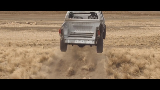 Video Reference: Vehicle, Off-roading, Car, Automotive tire, Off-road racing, Off-road vehicle, Sand, Automotive exterior, Automotive design, Tire, Person, Male