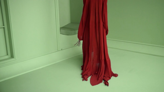 Video Reference: Red, Dress, Pink, Shoulder, Textile, Outerwear, Room, Curtain, Haute couture, Fashion design