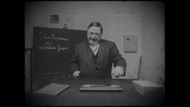 Video Reference: Photograph, Text, Standing, Snapshot, Portrait, Photography, Sitting, Black-and-white, Monochrome photography, Font