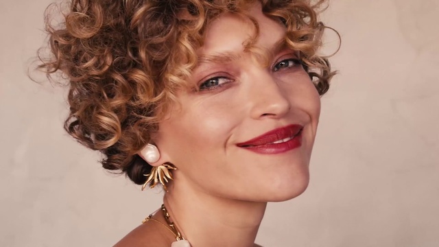 Video Reference: Hair, Face, Hairstyle, Chin, Lip, Eyebrow, Blond, Ringlet, Beauty, Cheek