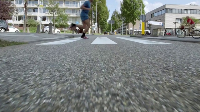 Video Reference: Asphalt, Road, Road surface, Infrastructure, Grass, Street, Thoroughfare, Recreation, Pedestrian, Lane