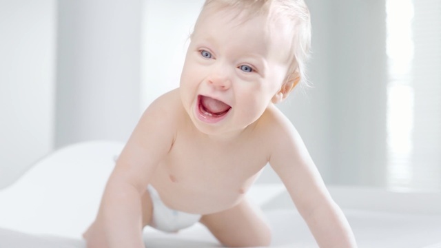Video Reference: Child, Baby, Skin, Facial expression, Toddler, Baby crawling, Cheek, Tummy time, Photography, Smile