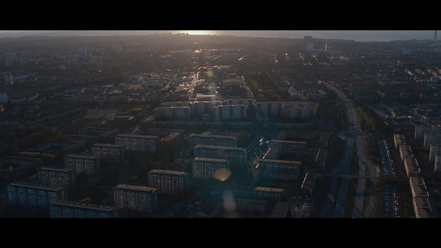 Video Reference: Aerial photography, Metropolitan area, Bird-eye view, Cityscape, Urban area, City, Atmosphere, Sky, Human settlement, Metropolis