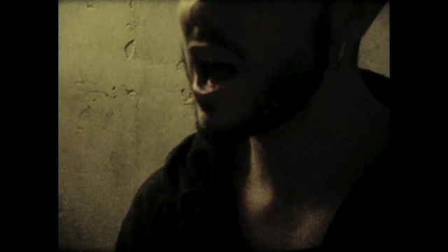 Video Reference: face, black, man, nose, facial hair, darkness, head, emotion, mouth, chin