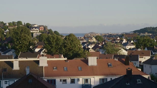 Video Reference: Roof, Residential area, Suburb, Neighbourhood, Property, Town, Urban area, Home, Human settlement, Sky