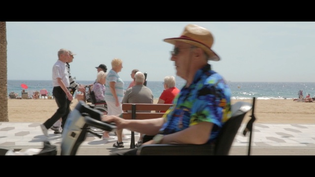 Video Reference: vacation, tourism, fun, water, recreation, beach, boardwalk, vehicle, travel, leisure, Person