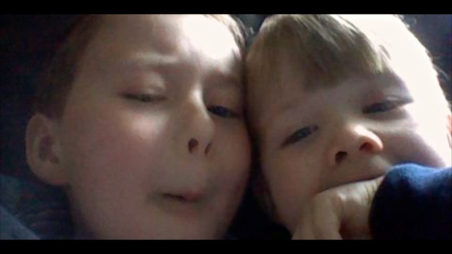 Video Reference: face, person, nose, cheek, human hair color, child, head, chin, forehead, kiss