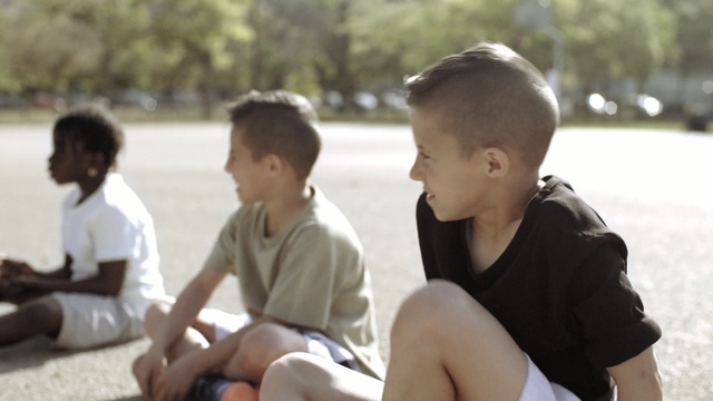 Video Reference: people, person, sitting, male, child, boy, fun, recreation, vacation, girl