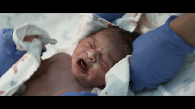 Video Reference: face, nose, childbirth, head, child, infant, mouth, human, patient, finger