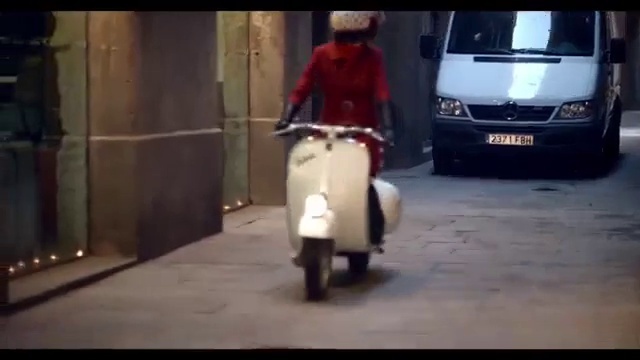 Video Reference: Mode of transport, Scooter, Vehicle, Vespa, Snapshot, Car, Asphalt, Automotive wheel system, Automotive exterior, Photography