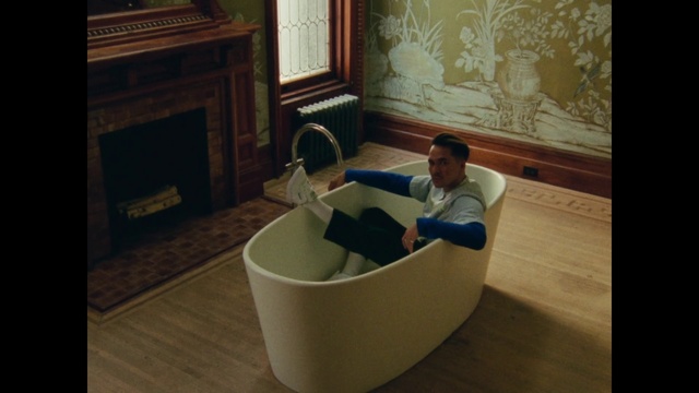 Video Reference: Floor, Flooring, Furniture, Bathtub, Room, Hardwood, Interior design, Table