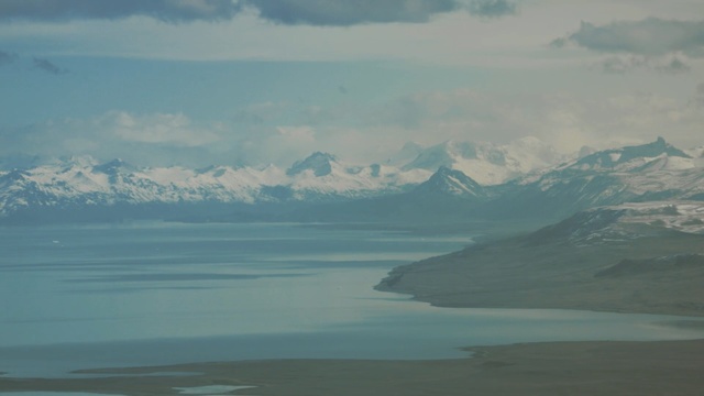 Video Reference: Sky, Atmospheric phenomenon, Ice, Sea, Ocean, Sound, Arctic, Mountain range, Arctic ocean, Cloud