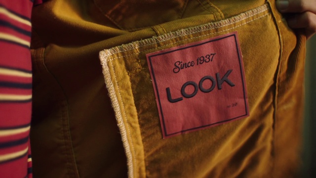 Video Reference: Text, Font, Pink, Magenta, Textile, Material property, Jacket, Linens