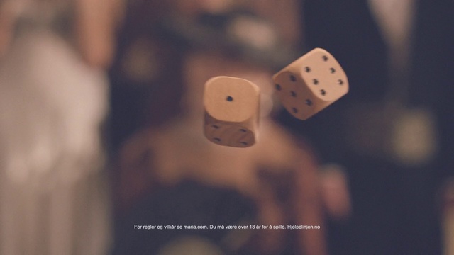 Video Reference: Games, Dice game, Indoor games and sports, Dice, Recreation, Sky, Tabletop game, Wood, Play, Remote, Game, Indoor, Video, Control, Wii, Holding, Television, Sitting, Photo, Playing, White, Food, Hand, Man, Table, Black, Controller, Screenshot, Blur