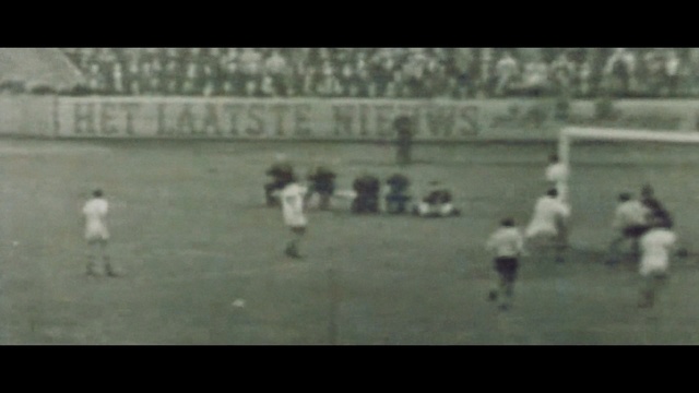 Video Reference: Football player, Player, Team sport, Football, Soccer player, Sport venue, Sports equipment, Ball game, Forward, Soccer, Person