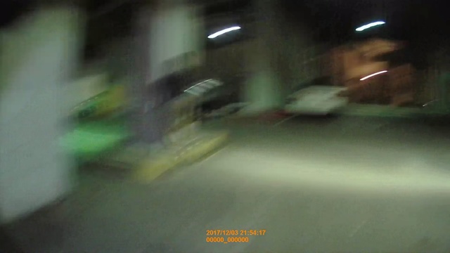 Video Reference: Green, Light, Night, Mode of transport, Street light, Lighting, Metropolitan area, Snapshot, Lane, Road