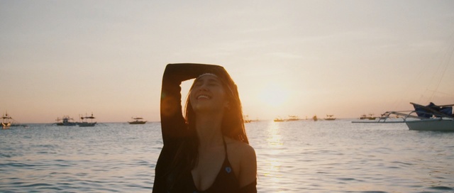 Video Reference: sea, body of water, sky, water, vacation, horizon, ocean, beach, calm, sunlight, Person