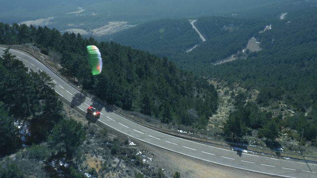 Video Reference: road, mountain pass, highway, mode of transport, infrastructure, mountain range, hill station, controlled access highway, geological phenomenon, mountain