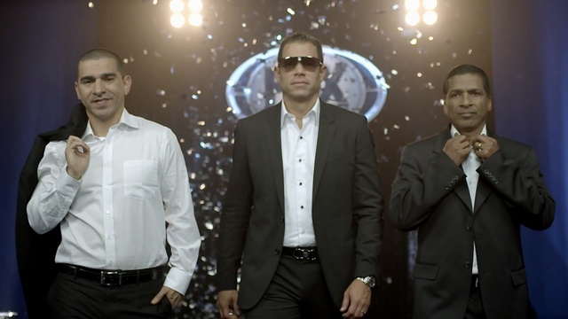 Video Reference: suit, gentleman, official, formal wear, event, Person