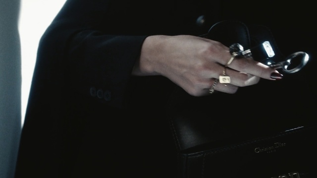 Video Reference: darkness, audio equipment, hand, microphone