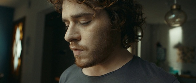 Video Reference: Hair, Face, Chin, Cheek, Facial hair, Nose, Eyebrow, Hairstyle, Head, Beard