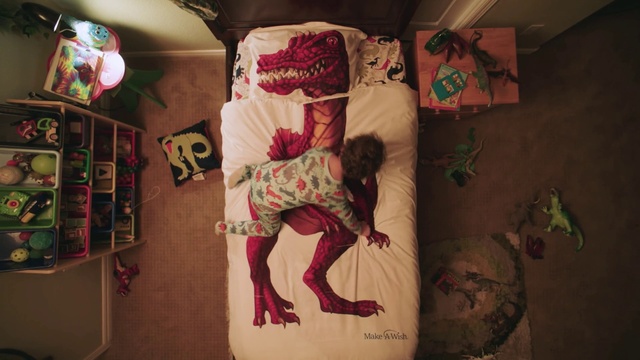 Video Reference: Pink, Art, Textile, Room, Flesh, Illustration, Visual arts, Indoor, Bear, Shoes, Dog, Small, Stuffed, Young, Sitting, Black, Little, Standing, Refrigerator, Playing, Holding, Kitchen, Bed, White, Man, Laying, Cat, Painting, Pillow, Cartoon