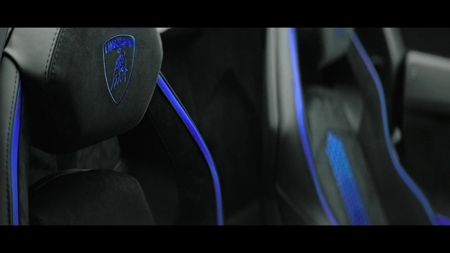 Video Reference: Automotive design, Light, Audio equipment, Automotive lighting, Electric blue, Font, Technology, Vehicle door, Photography, Auto part