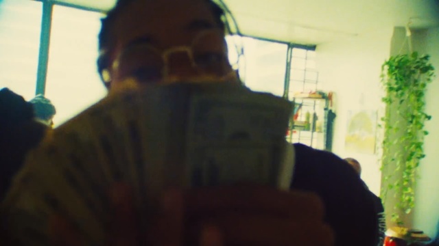 Video Reference: green, snapshot, standing, human, sunlight, fun, facial hair, angle, human behavior, Person