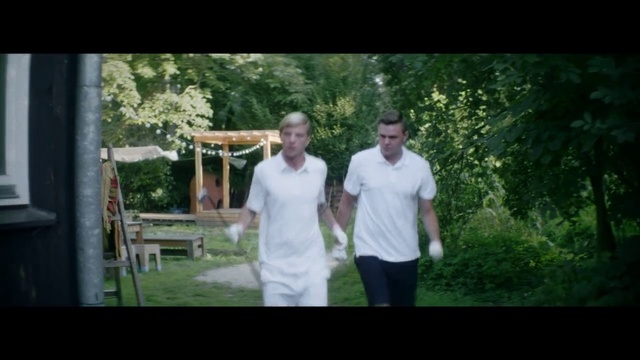 Video Reference: Photograph, People, Social group, Lawn, Fun, Male, Standing, Grass, Snapshot, Tree, Person, Man, Holding, Photo, Front, Woman, Game, Young, Posing, Wearing, Shirt, Smiling, Boy, Green, Ball, White, Court, Room, Umbrella, Air, Clothing, Smile, Plant