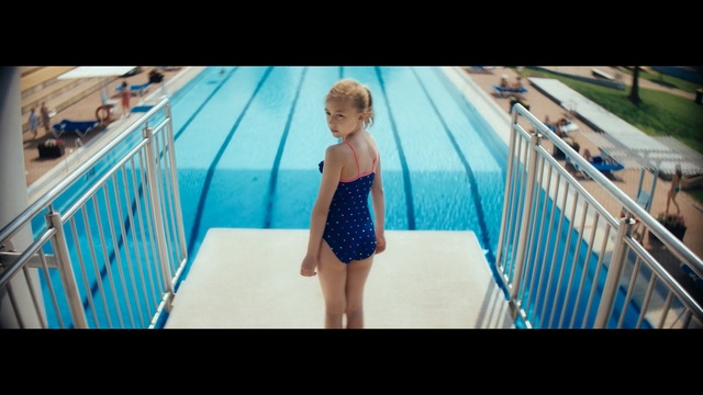 Video Reference: Photograph, Blue, Fun, Aqua, Turquoise, Leisure, Snapshot, Child, Summer, Vacation, Fence, Indoor, Person, Young, Striped, Looking, Board, Building, Girl, Standing, Front, Small, Man, Boy, Laptop, Bed, Woman, Sitting, Television, Screen, Monitor, Table, Holding, Computer, Room, Surfing, White, Riding, Playing, Doing, Swimming, Swimwear, Clothing, Swimming pool, Dress, Human face