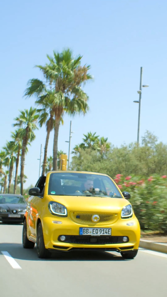 Video Reference: Land vehicle, Vehicle, Car, Motor vehicle, Yellow, Mode of transport, City car, Mid-size car, Hatchback, Automotive design, Person