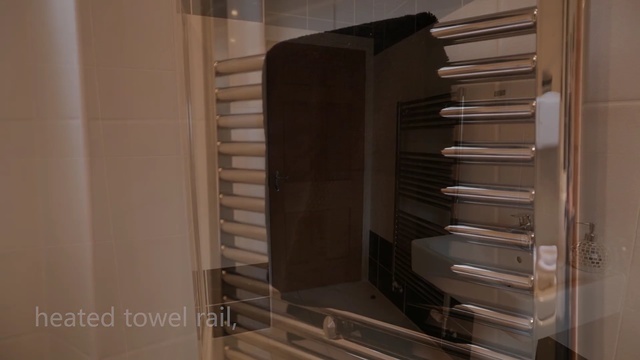 Video Reference: room, cabinetry, closet, furniture, flooring, Person