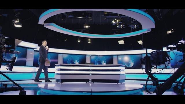 Video Reference: Stage, Television studio, Display device, Performance, Event, Building, Vehicle, Leisure, Sport venue, Car