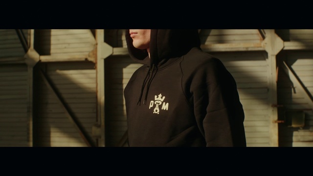 Video Reference: Black, Light, T-shirt, Jacket, Standing, Outerwear, Darkness, Sleeve, Human, Photography