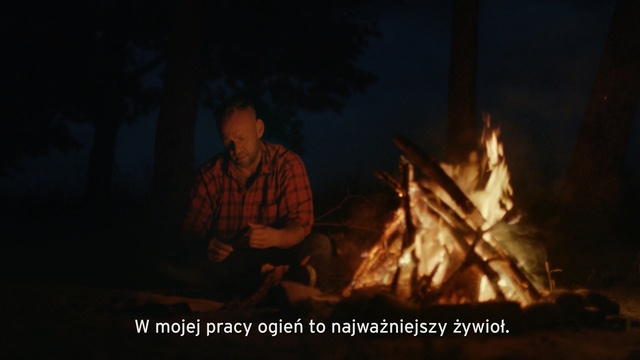 Video Reference: Fire, Campfire, Heat, Bonfire, Flame, Adaptation, Event, Person, Man, Dark, Front, Lit, Light, Sitting, Standing, Street, Holding, Table, Sun, Pole, Walking, Large, Riding, Night, Yellow, Young, Room, Board, Sign, Traffic, Bed, Text, Screenshot, Nature, Human face, Fireplace