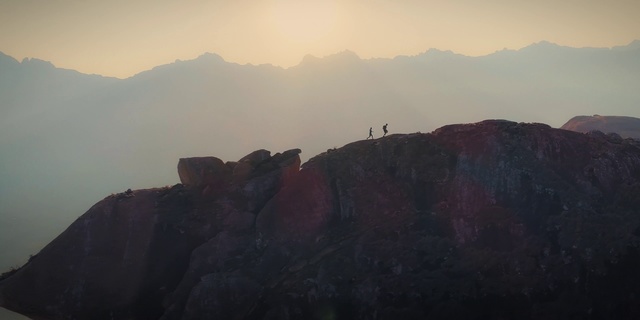 Video Reference: Sky, Mountainous landforms, Atmospheric phenomenon, Mountain, Badlands, Cloud, Ridge, Horizon, Atmosphere, Morning