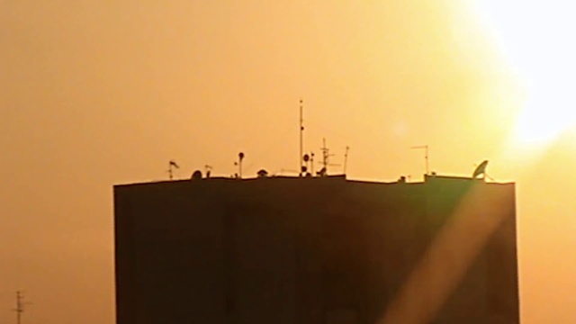 Video Reference: Sky, Atmospheric phenomenon, Morning, Horizon, Sunlight, Evening, Calm, Haze, Sun, Sunrise