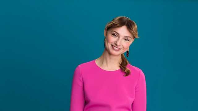 Video Reference: blue, facial expression, beauty, smile, shoulder, standing, girl, portrait, neck, happiness, Person